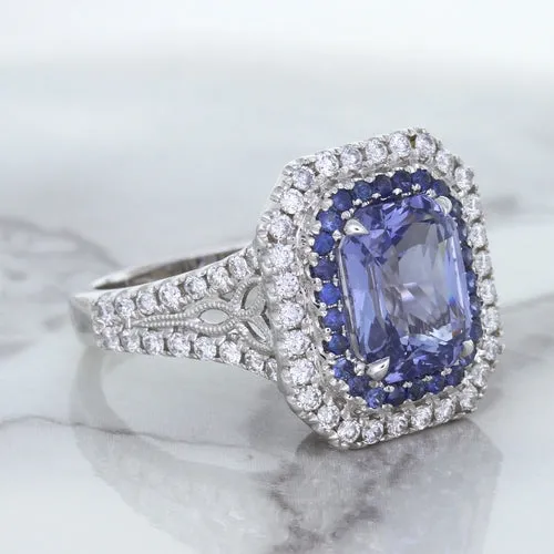 4.33ct Radiant Cut Blue Sapphire Ring with Sapphire and Diamond Halos in 18K White Gold