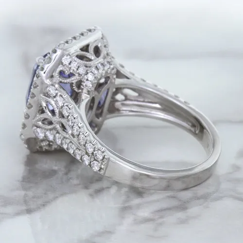 4.33ct Radiant Cut Blue Sapphire Ring with Sapphire and Diamond Halos in 18K White Gold