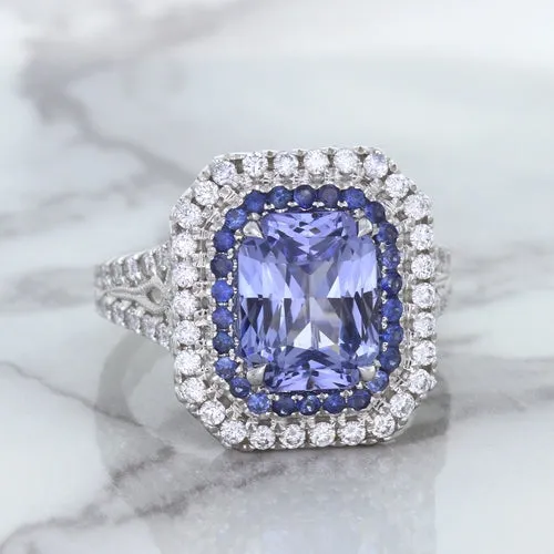4.33ct Radiant Cut Blue Sapphire Ring with Sapphire and Diamond Halos in 18K White Gold