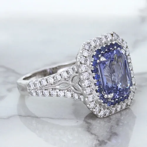 4.33ct Radiant Cut Blue Sapphire Ring with Sapphire and Diamond Halos in 18K White Gold