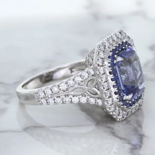 4.33ct Radiant Cut Blue Sapphire Ring with Sapphire and Diamond Halos in 18K White Gold