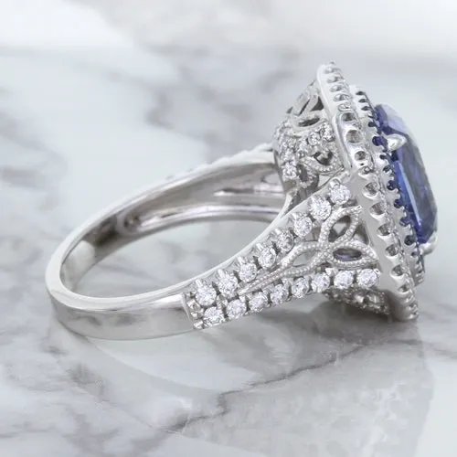 4.33ct Radiant Cut Blue Sapphire Ring with Sapphire and Diamond Halos in 18K White Gold