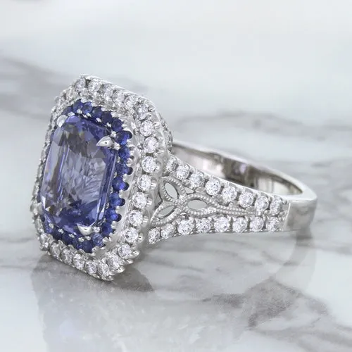 4.33ct Radiant Cut Blue Sapphire Ring with Sapphire and Diamond Halos in 18K White Gold