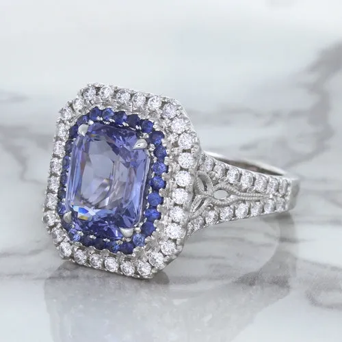 4.33ct Radiant Cut Blue Sapphire Ring with Sapphire and Diamond Halos in 18K White Gold