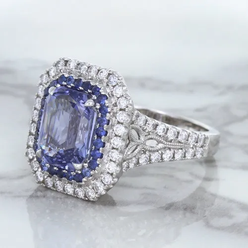 4.33ct Radiant Cut Blue Sapphire Ring with Sapphire and Diamond Halos in 18K White Gold