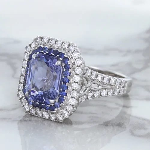 4.33ct Radiant Cut Blue Sapphire Ring with Sapphire and Diamond Halos in 18K White Gold
