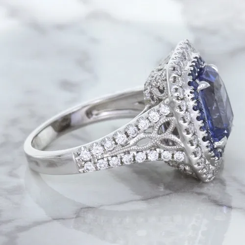 4.33ct Radiant Cut Blue Sapphire Ring with Sapphire and Diamond Halos in 18K White Gold