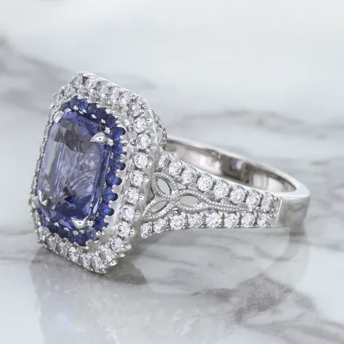 4.33ct Radiant Cut Blue Sapphire Ring with Sapphire and Diamond Halos in 18K White Gold