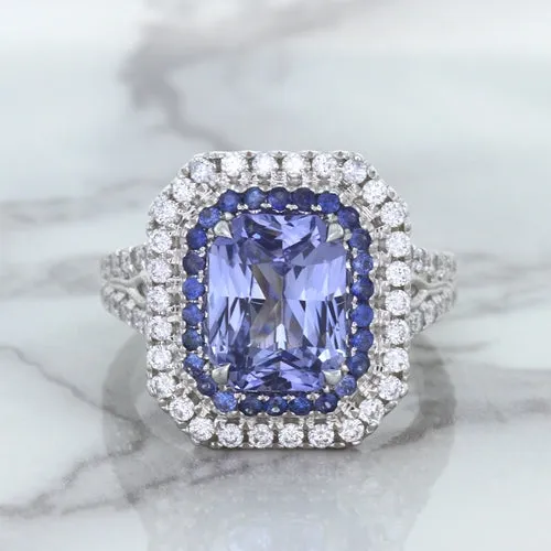 4.33ct Radiant Cut Blue Sapphire Ring with Sapphire and Diamond Halos in 18K White Gold