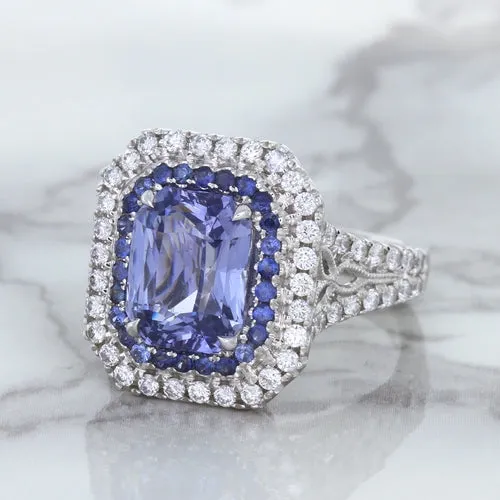 4.33ct Radiant Cut Blue Sapphire Ring with Sapphire and Diamond Halos in 18K White Gold