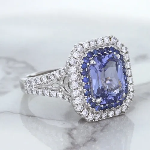 4.33ct Radiant Cut Blue Sapphire Ring with Sapphire and Diamond Halos in 18K White Gold