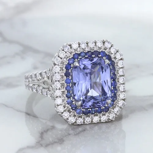 4.33ct Radiant Cut Blue Sapphire Ring with Sapphire and Diamond Halos in 18K White Gold