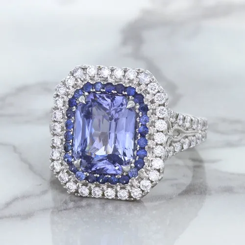 4.33ct Radiant Cut Blue Sapphire Ring with Sapphire and Diamond Halos in 18K White Gold