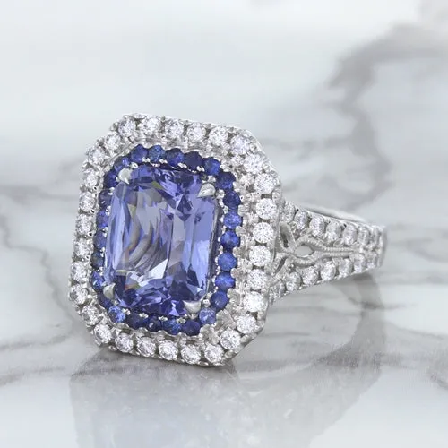 4.33ct Radiant Cut Blue Sapphire Ring with Sapphire and Diamond Halos in 18K White Gold
