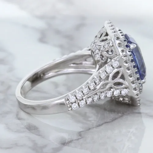 4.33ct Radiant Cut Blue Sapphire Ring with Sapphire and Diamond Halos in 18K White Gold