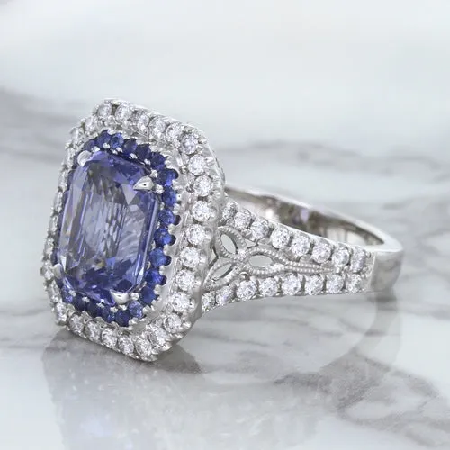 4.33ct Radiant Cut Blue Sapphire Ring with Sapphire and Diamond Halos in 18K White Gold