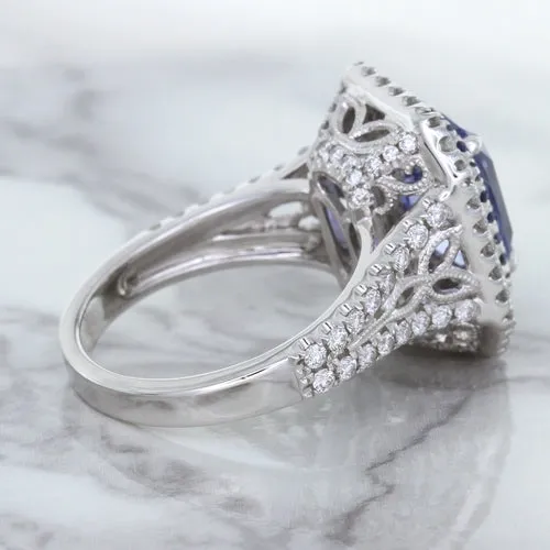 4.33ct Radiant Cut Blue Sapphire Ring with Sapphire and Diamond Halos in 18K White Gold