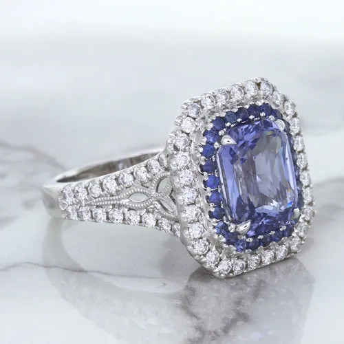 4.33ct Radiant Cut Blue Sapphire Ring with Sapphire and Diamond Halos in 18K White Gold
