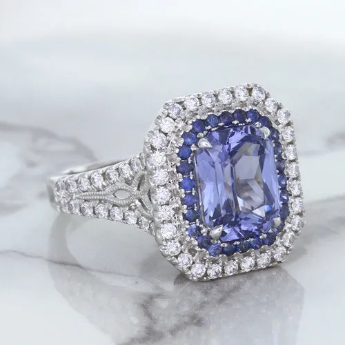 4.33ct Radiant Cut Blue Sapphire Ring with Sapphire and Diamond Halos in 18K White Gold