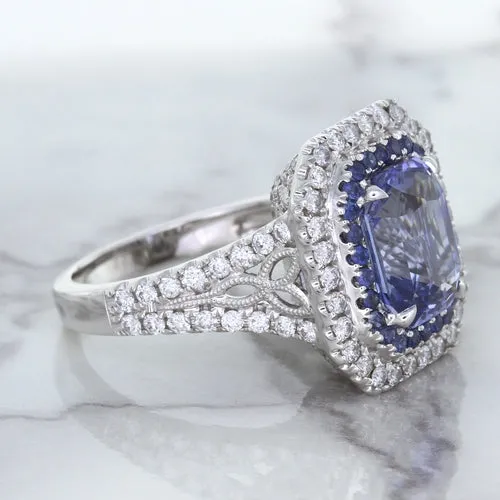 4.33ct Radiant Cut Blue Sapphire Ring with Sapphire and Diamond Halos in 18K White Gold