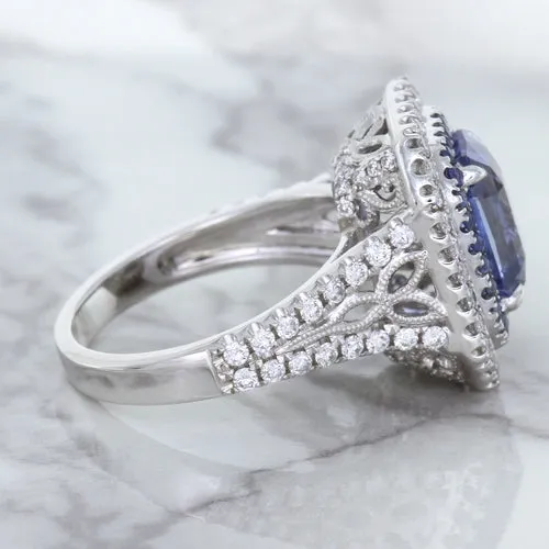 4.33ct Radiant Cut Blue Sapphire Ring with Sapphire and Diamond Halos in 18K White Gold