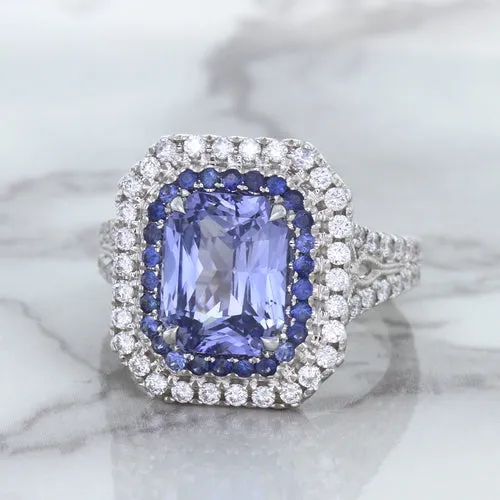 4.33ct Radiant Cut Blue Sapphire Ring with Sapphire and Diamond Halos in 18K White Gold