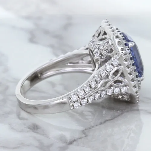 4.33ct Radiant Cut Blue Sapphire Ring with Sapphire and Diamond Halos in 18K White Gold