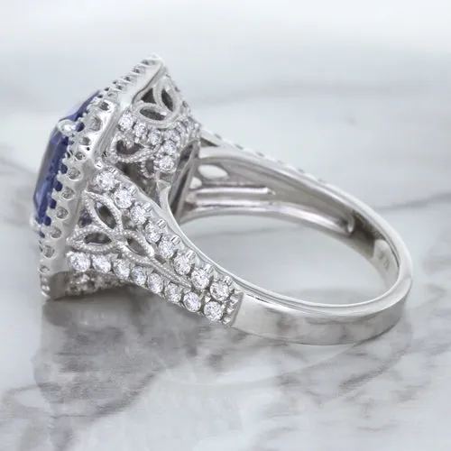 4.33ct Radiant Cut Blue Sapphire Ring with Sapphire and Diamond Halos in 18K White Gold