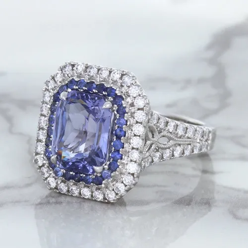 4.33ct Radiant Cut Blue Sapphire Ring with Sapphire and Diamond Halos in 18K White Gold