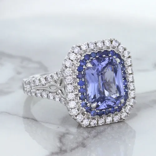 4.33ct Radiant Cut Blue Sapphire Ring with Sapphire and Diamond Halos in 18K White Gold