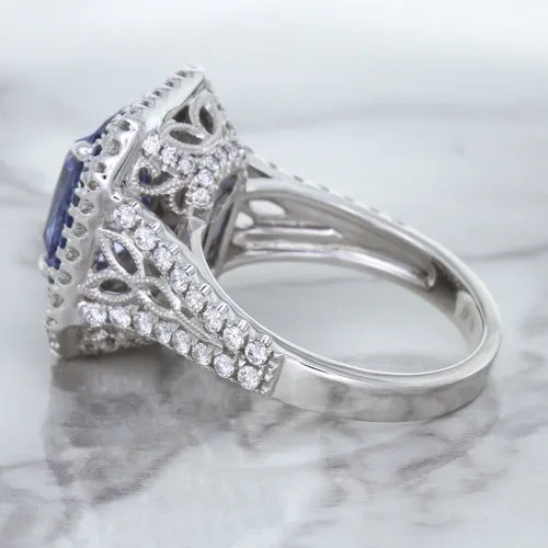 4.33ct Radiant Cut Blue Sapphire Ring with Sapphire and Diamond Halos in 18K White Gold