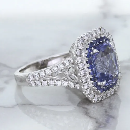 4.33ct Radiant Cut Blue Sapphire Ring with Sapphire and Diamond Halos in 18K White Gold