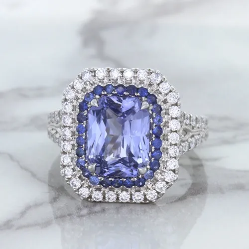 4.33ct Radiant Cut Blue Sapphire Ring with Sapphire and Diamond Halos in 18K White Gold
