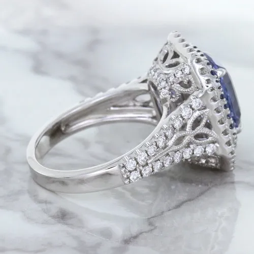 4.33ct Radiant Cut Blue Sapphire Ring with Sapphire and Diamond Halos in 18K White Gold