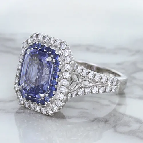 4.33ct Radiant Cut Blue Sapphire Ring with Sapphire and Diamond Halos in 18K White Gold