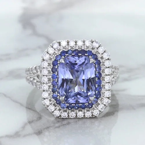 4.33ct Radiant Cut Blue Sapphire Ring with Sapphire and Diamond Halos in 18K White Gold