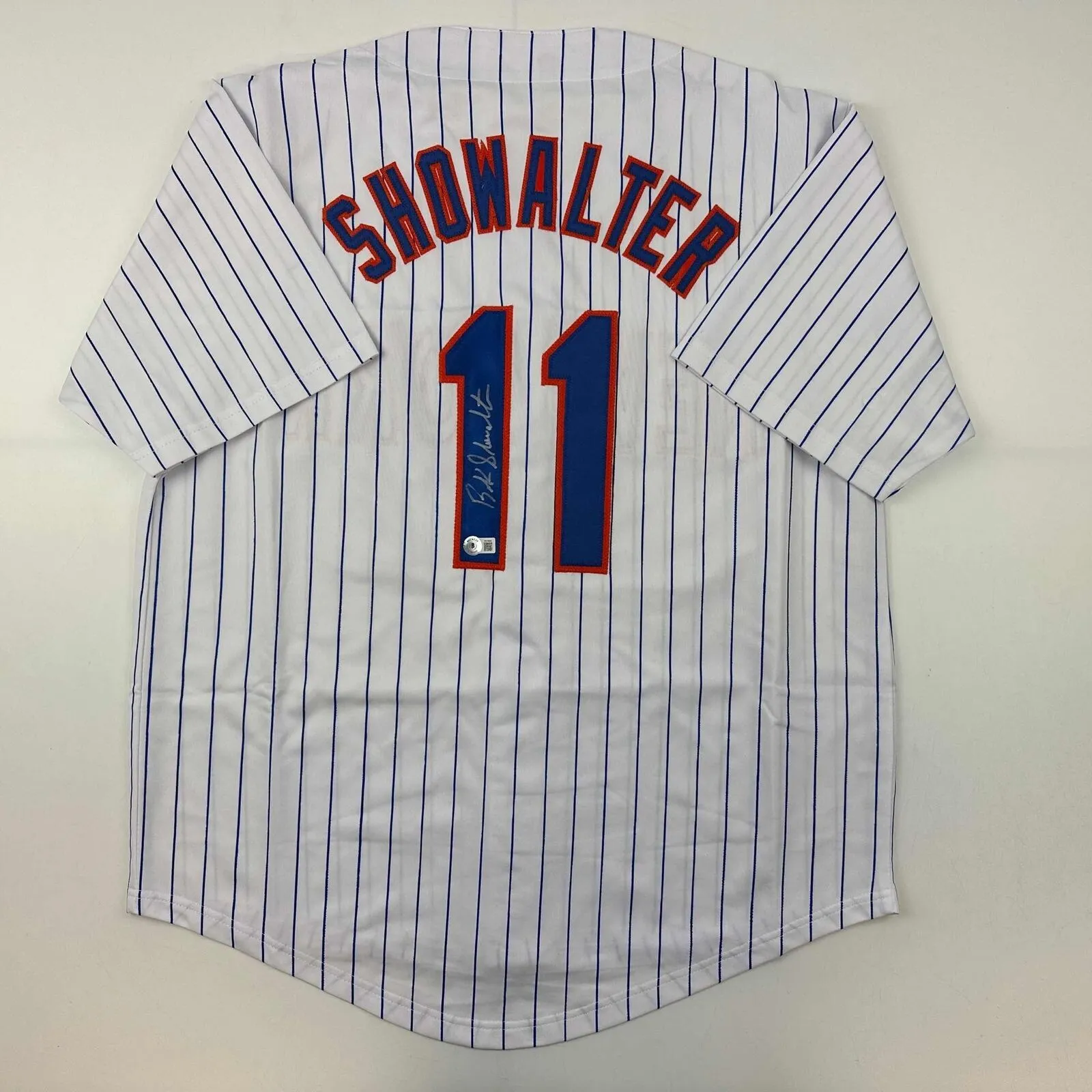 Autographed/Signed Buck Showalter New York Pinstripe Jersey Beckett BAS COA