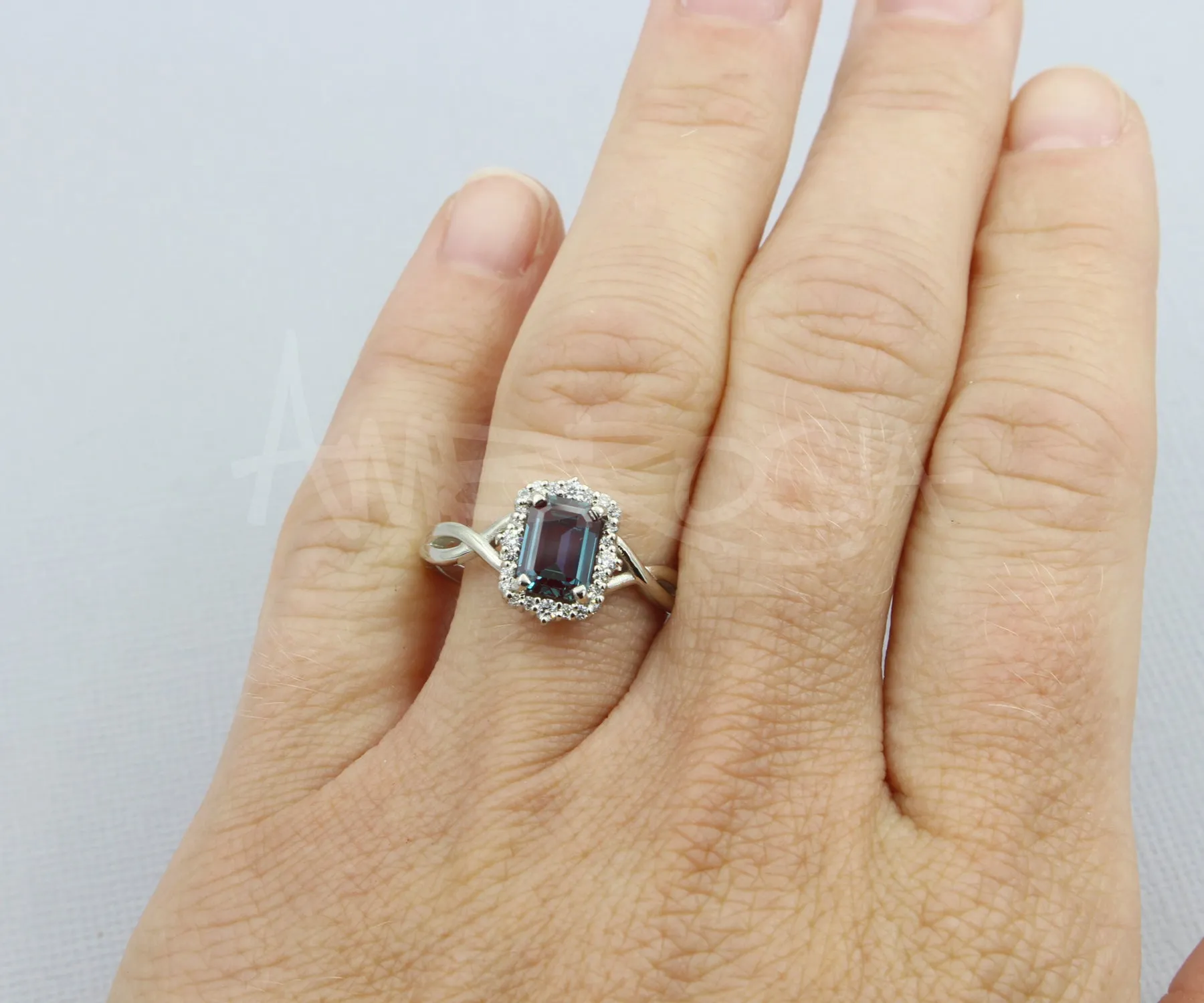Emerald cut Alexandrite Halo Twist Diamond Engagement Ring