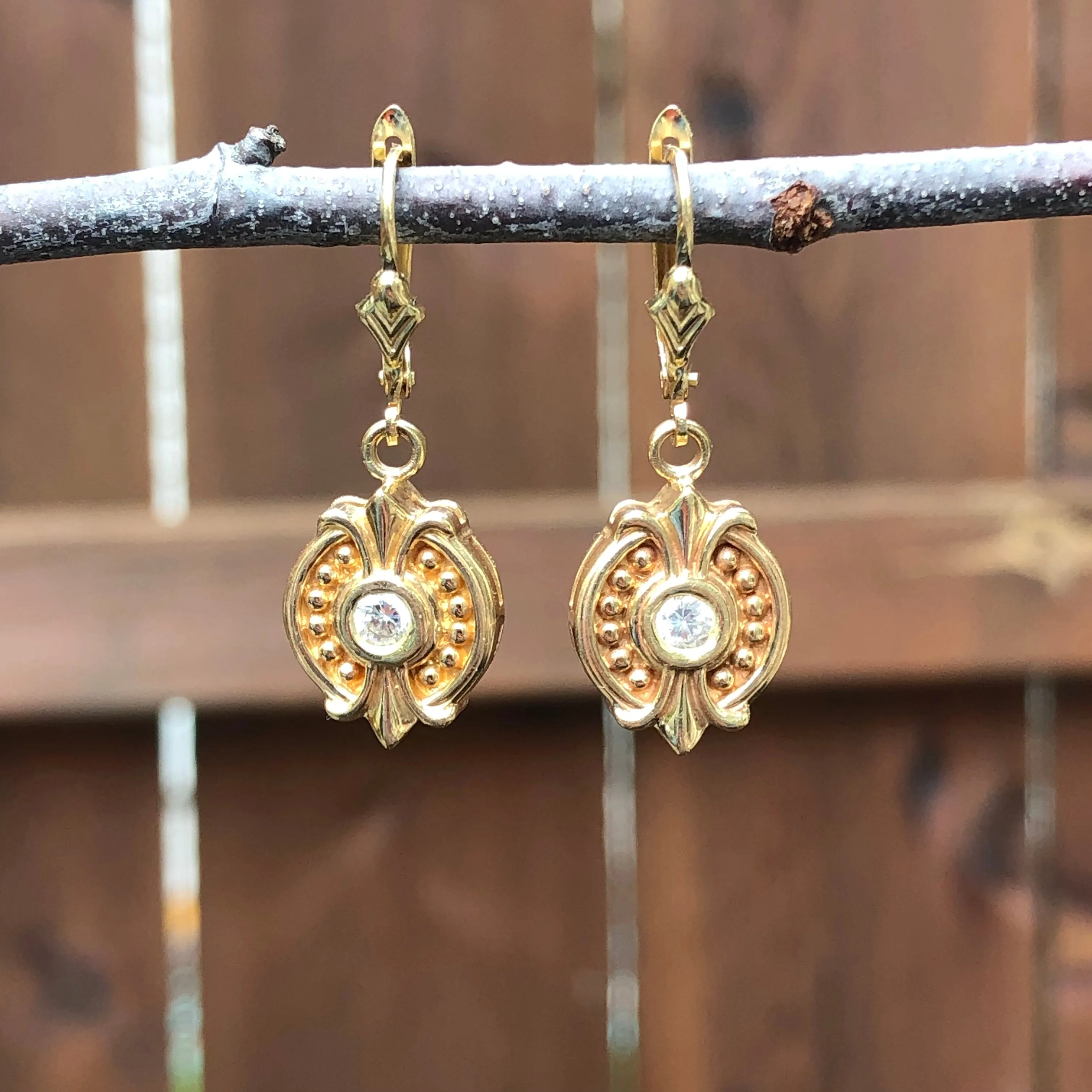 Estate 14KT Yellow Gold .30 CT Bezel Set Diamond Lever Back Earrings