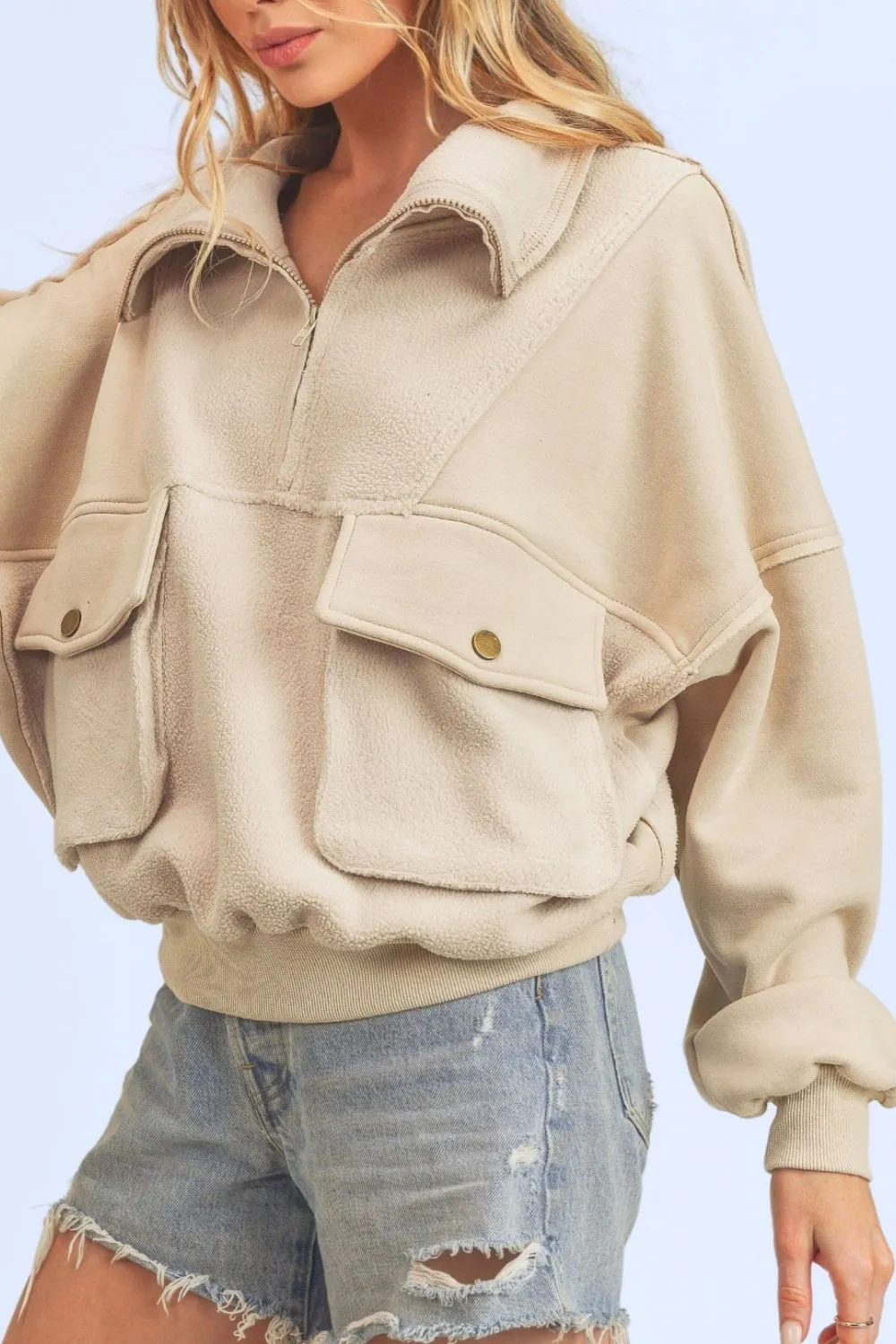 Exposed Seam Half Zip Cream Color Sweatshirt with Pockets