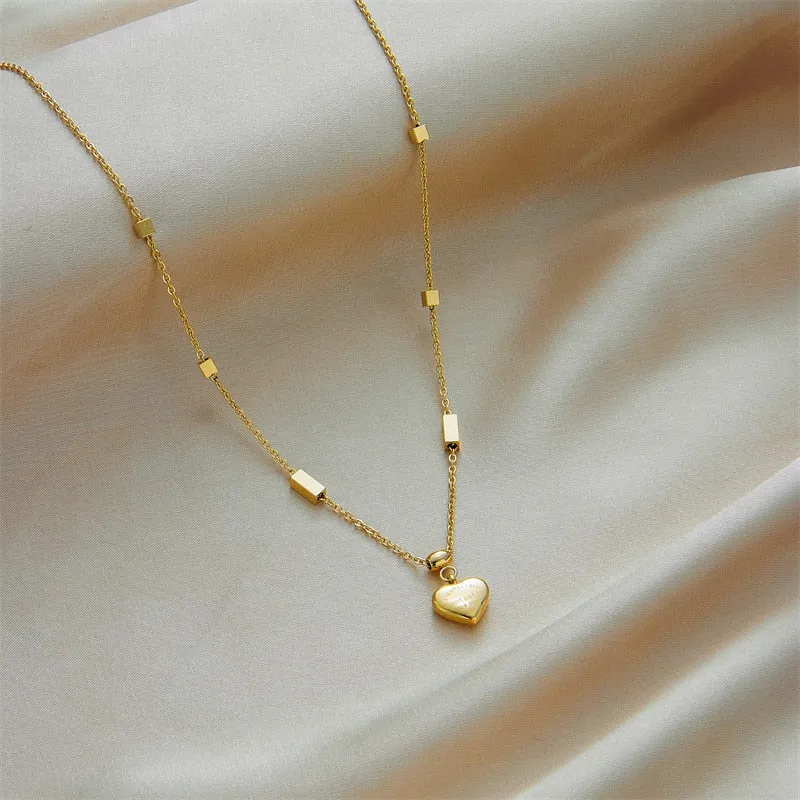 Exquisite Gold-Tone Heart Pendant Necklace in Stainless Steel A Fashionable Gift of Love and Style for Women, Ladies, and Girls