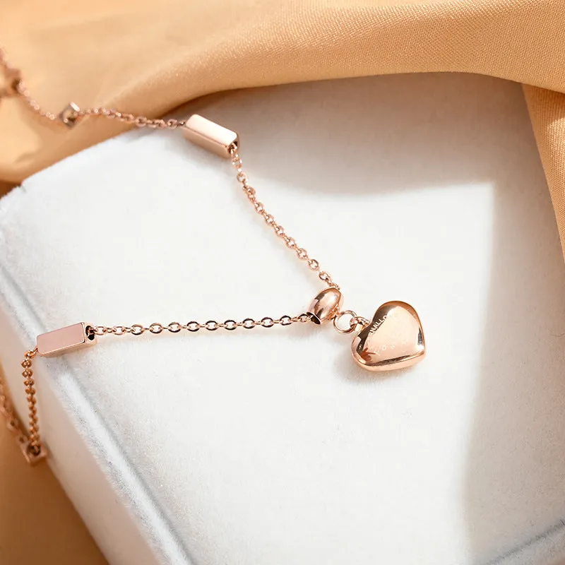Exquisite Gold-Tone Heart Pendant Necklace in Stainless Steel A Fashionable Gift of Love and Style for Women, Ladies, and Girls