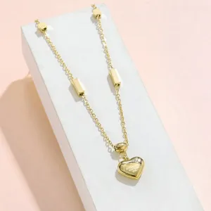 Exquisite Gold-Tone Heart Pendant Necklace in Stainless Steel A Fashionable Gift of Love and Style for Women, Ladies, and Girls