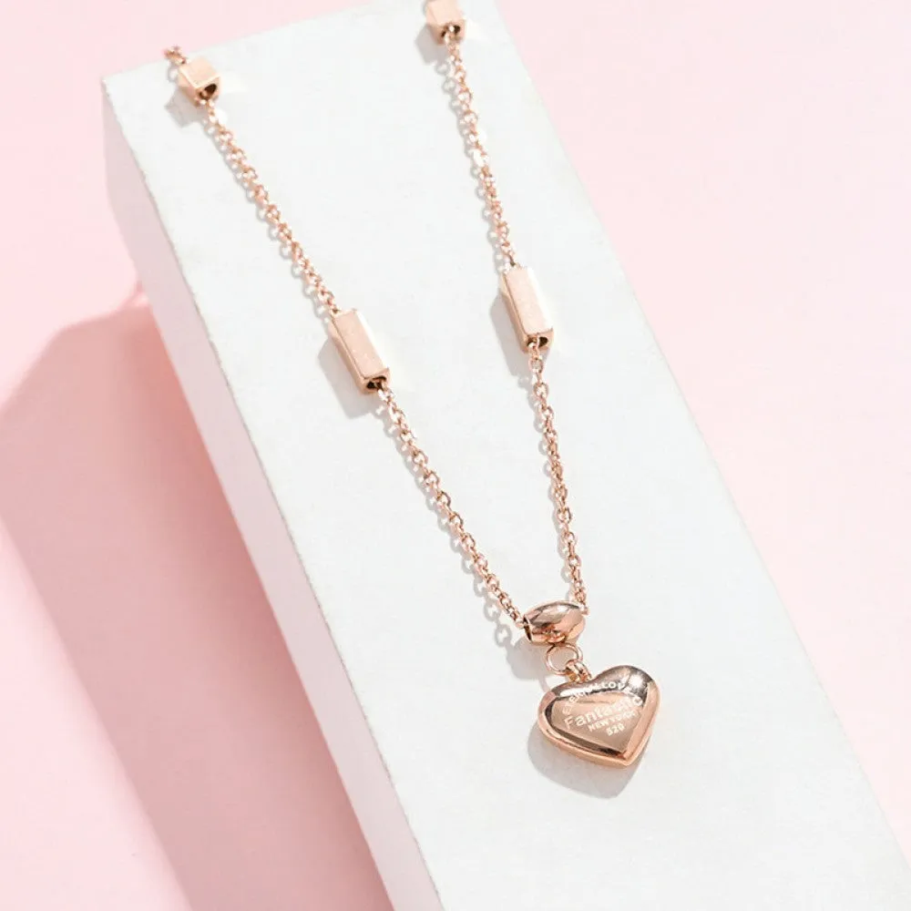 Exquisite Gold-Tone Heart Pendant Necklace in Stainless Steel A Fashionable Gift of Love and Style for Women, Ladies, and Girls