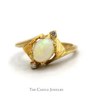 Oval Opal Ring with Double Diamond Accents in 14k Yellow Gold
