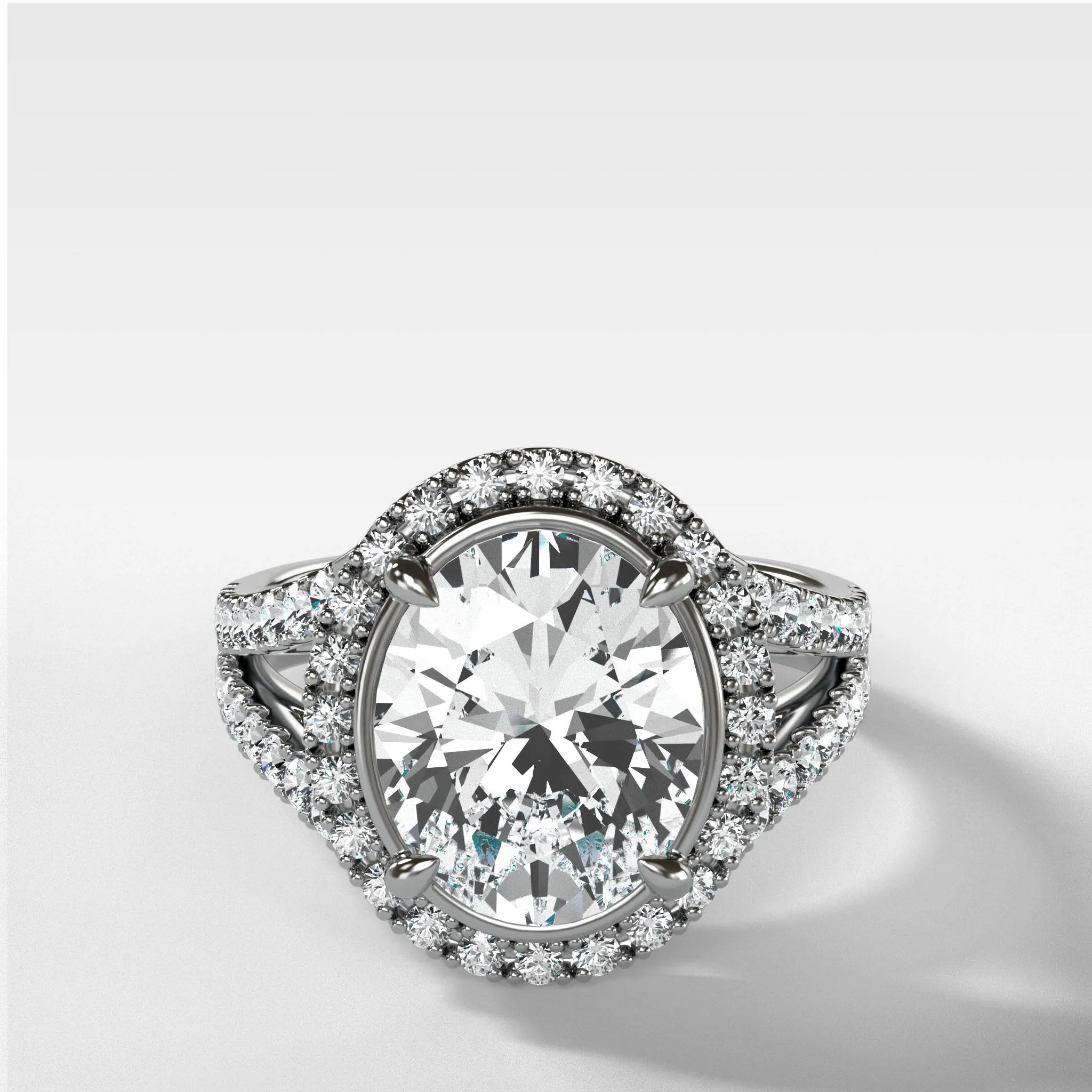 Split Shank Halo Engagement Ring With Oval Cut Diamond