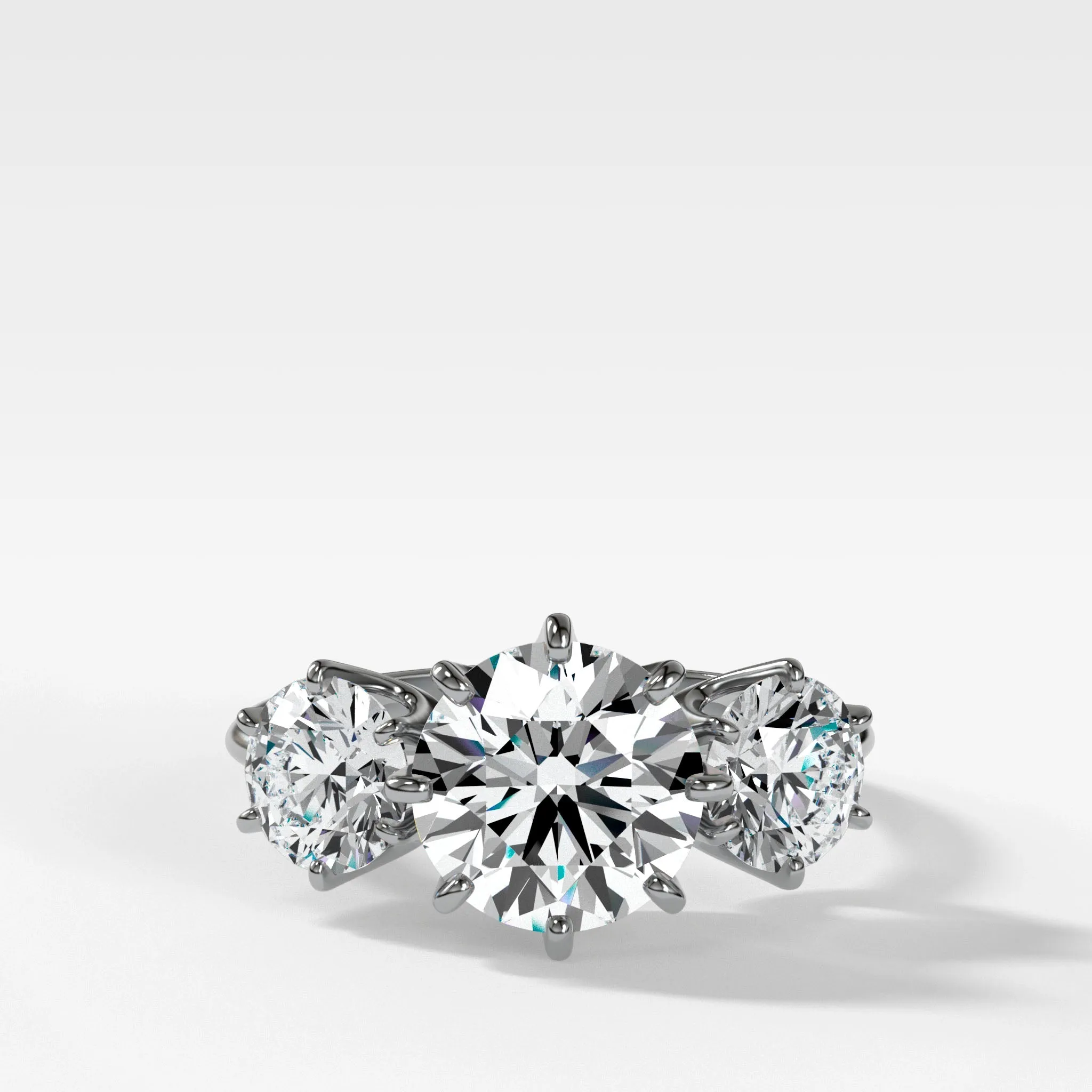 Vintage Eight Prong Three Stone Engagement Ring With Round Diamonds